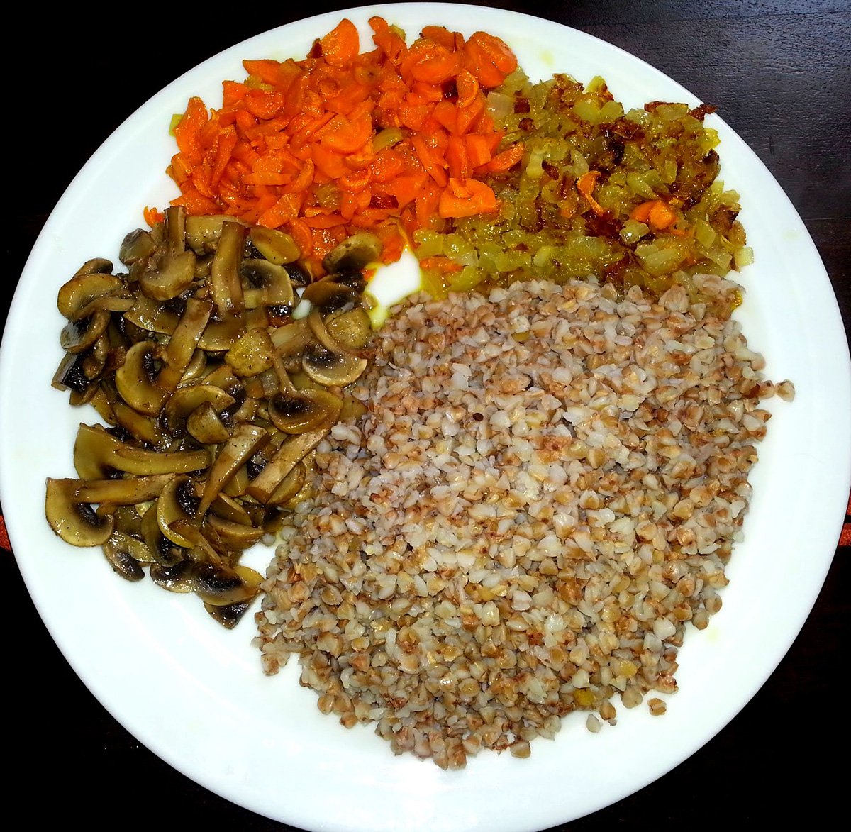 Kasha with mushrooms, onions and carrots